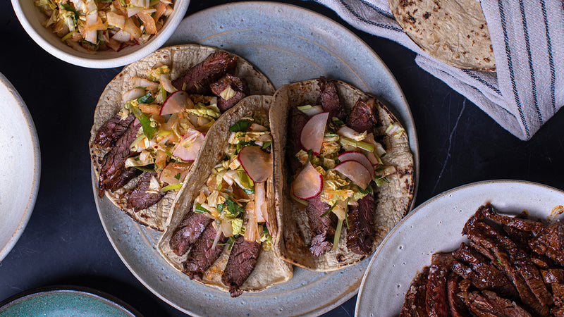 Wagyu Skirt Steak Tacos with Kimchi Slaw