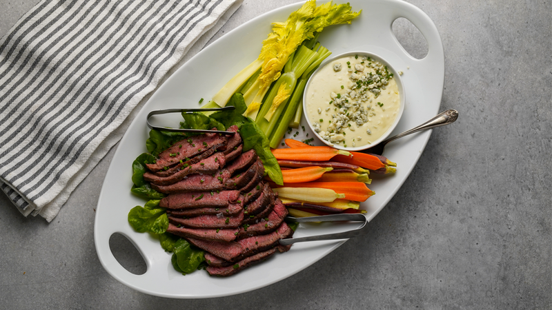 SRF Flat Iron Steak Sliced and plated with blue cheese