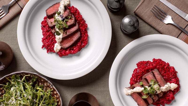 Wagyu Ribeye Filet with Beet Risotto on plate