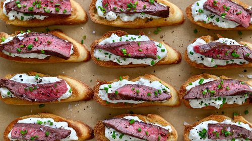 Flank Steak Crostini with Blue Cheese Sauce