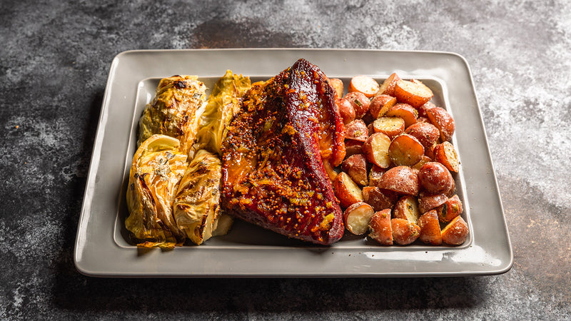 Dijon-Glazed Corned Beef with Savory Cabbage and Red Potatoes