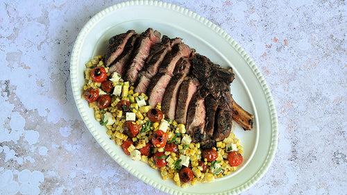 Grilled Cowboy Steak with Blistered Corn and Cherry Tomato Salad