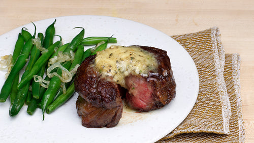 Rolled Cap of Ribeye with Garlic Herb Compound Butter