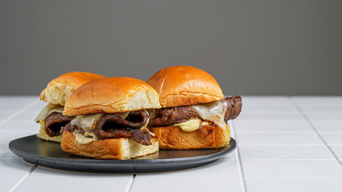 Cheesesteak Sliders with Caramelized Onions and Dijon Aioli