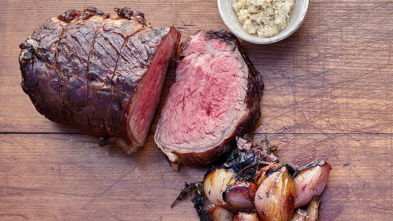 Smoked Eye of the Ribeye Roast with Fire-Roasted Shallots