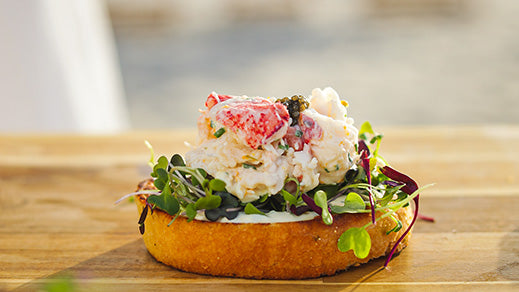 Open-Faced Lobster Roll with Orange-Chive Crème Fraiche and Caviar