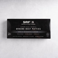 Box of Snake River Farms American Wagyu Ground Beef Patties on a light gray background