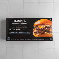 Snake River Farms American Wagyu Beef Smash Burger Patties packaging on a tiled wall.