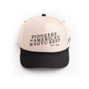 A beige 5-panel baseball cap with black brim and embroidery that reads 'Pioneers of American Wagyu Beef' on the front and 'SRF' on the side, set against a white background.