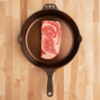 USDA Choice Ribeye 1" steak in cast iron 