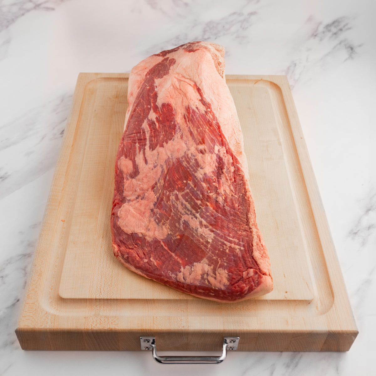 USDA Choice Brisket on cutting board 