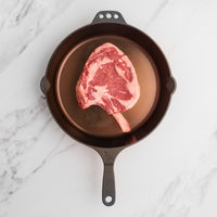 USDA Choice cowboy steak in pan |Choice