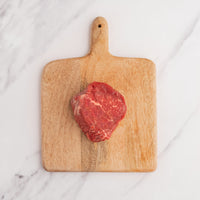 USDA Choice Filet Mignon 8 oz on cutting board 