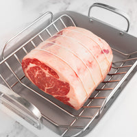 prime rib tied in roasting pan 