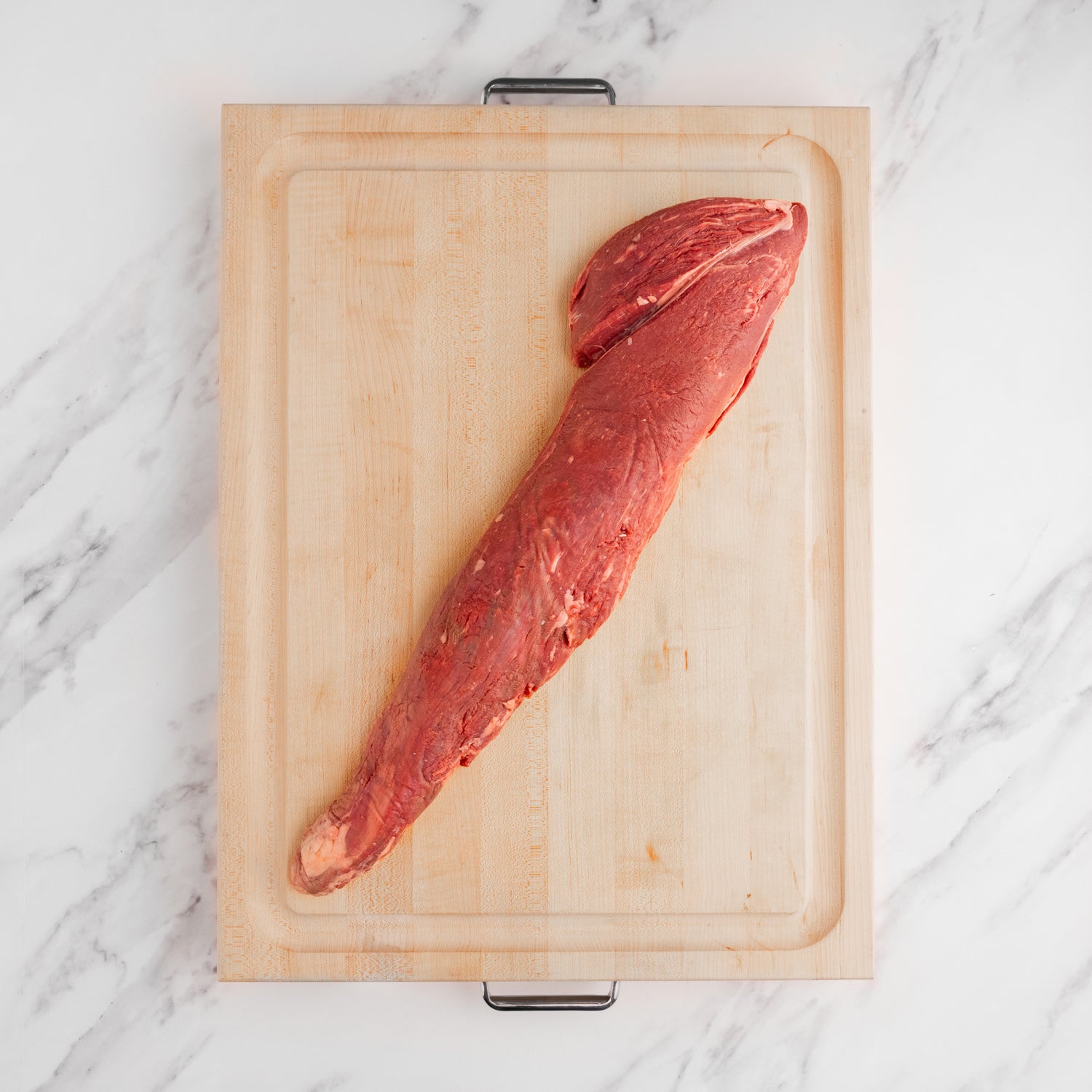 USDA Choice Tenderloin roast on cutting board 