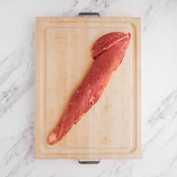 USDA Choice Tenderloin roast on cutting board 