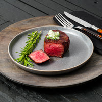 cooked Manhattan Filet with rosemary springs 