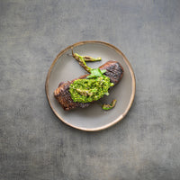 cooked and plated zabuton with chimichurri 