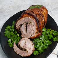 Cooked and sliced porchetta plated 