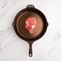 Bone-In Ribeye Steak in Cast Iron Pan 