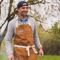 Guy BBQ earing a SRF apron 