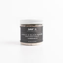 Jar of Garlic & Black Pepper Infused Salt by SRF on a white background
