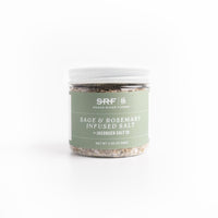 Jar of Sage & Rosemary Infused Salt with SRF label on a white background