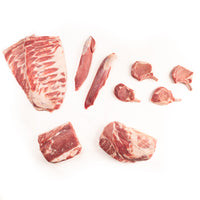 Raw meat pieces of Kurobuta Pork on a white background