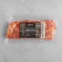 Raw bacon in packaging 