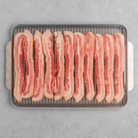 Raw bacon on rack