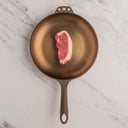 Kurobuta boneless pork chop in cast iron skillet 