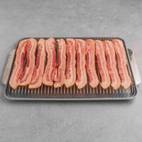 Raw bacon on rack