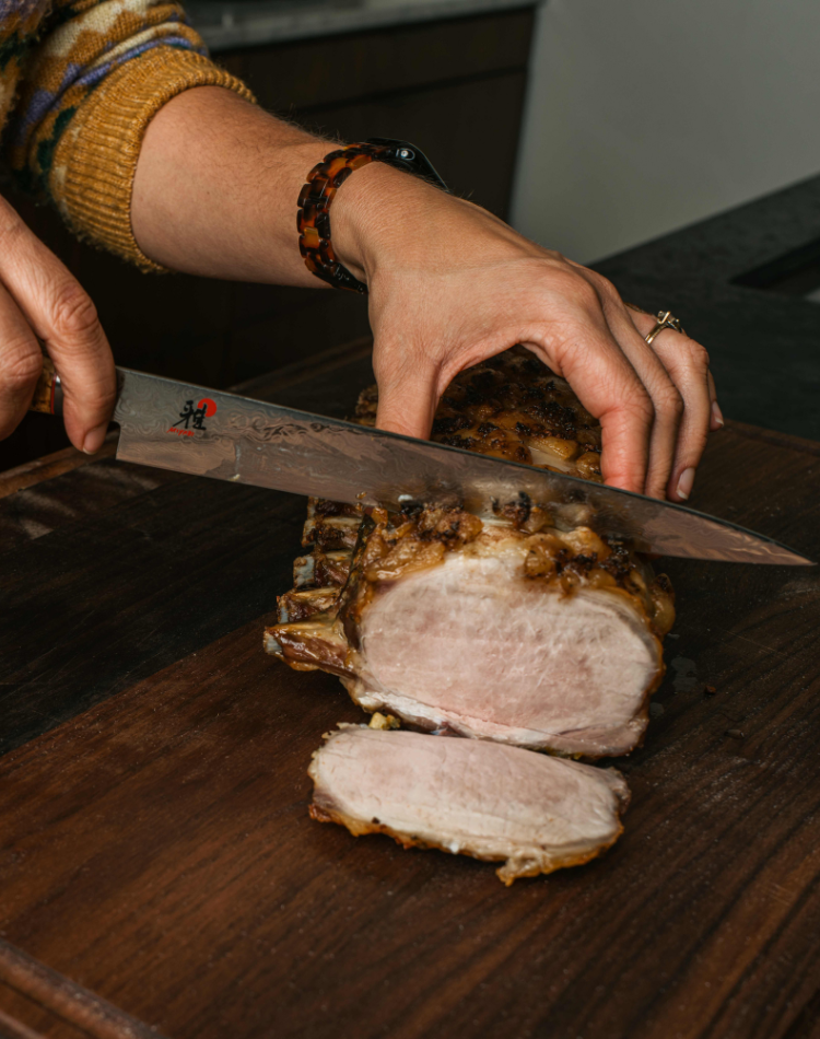 Kurobuta Pork Roast being sliced