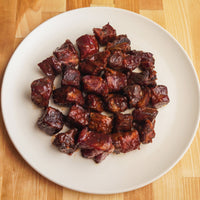 smoked pork burnt ends with sauce 