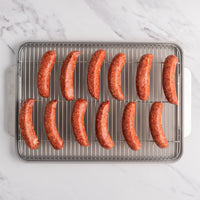 raw beef sausage on rack 