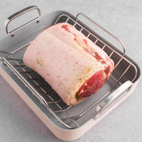 raw porchetta roast in pan 