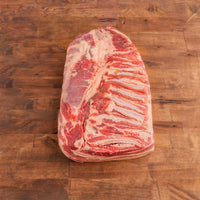 Kurobuta pork belly on wood background 