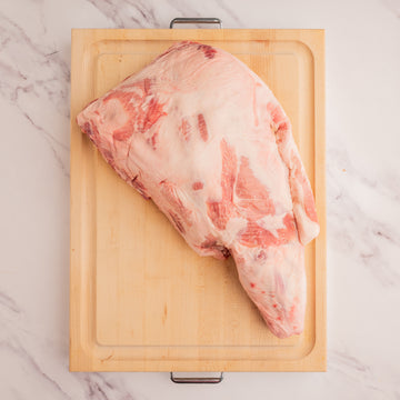 Kurobuta Pork Shoulder on cutting board 