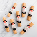 7 SRF Salami packages on marbled background