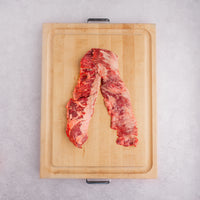 skirt steak on cutting board