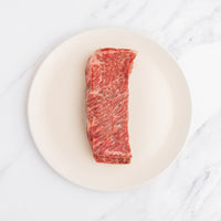  raw SRF Black® Zabuton steak on white plate 