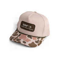 Beige cap with camouflage brim and SRF logo on a white background