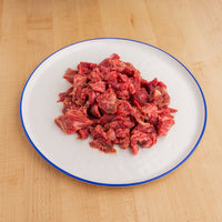 raw fajita slices on white plate 