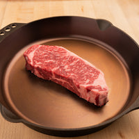 SRF Gold® NY strip steak in skillet |SRF Gold®|1"|1.5"