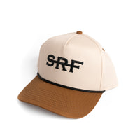 Beige and brown cap with 'SRF' logo on a white background