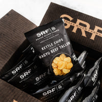 Snake River Farms kettle chips packaging with branding and product details.