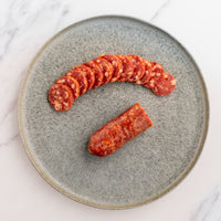 Sliced Soppressata on a plate 