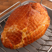 whole bone-in ham in roast pan 