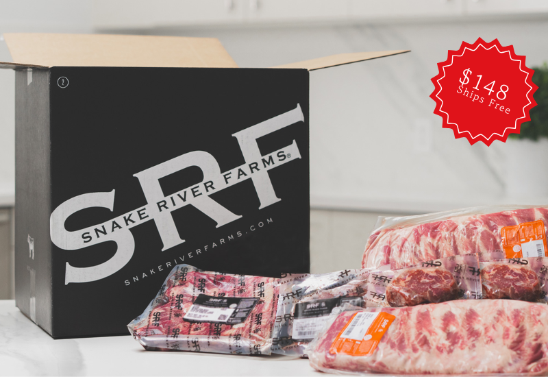 Snake River Farms packaging with raw meat products and a promotional sticker on a light background