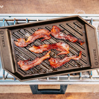 Apple Brined Bacon cooked on a grill 